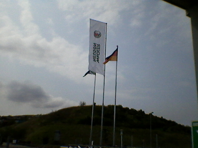 Photo of 12m Flagpole with rotary arm and two 9m standard flagpoles